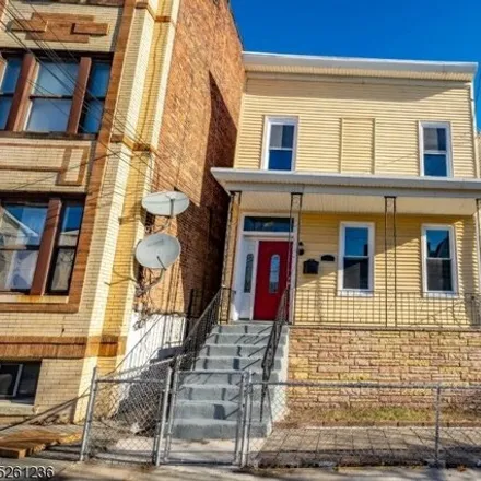 Buy this 4 bed house on 164 Winfield Avenue in Greenville, Jersey City