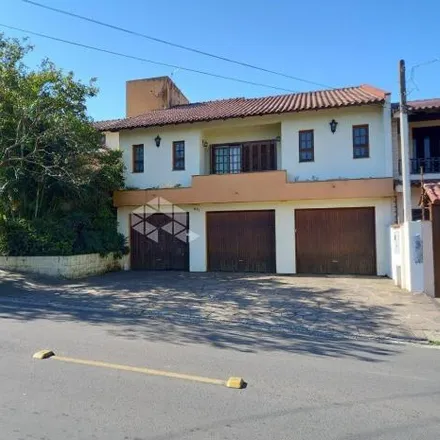 Buy this 5 bed house on Rua Pompílio Gomes in Dom Feliciano, Gravataí - RS