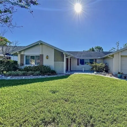 Buy this 2 bed house on 12360 Hounds Tooth Lane in Bayonet Point, FL 34667