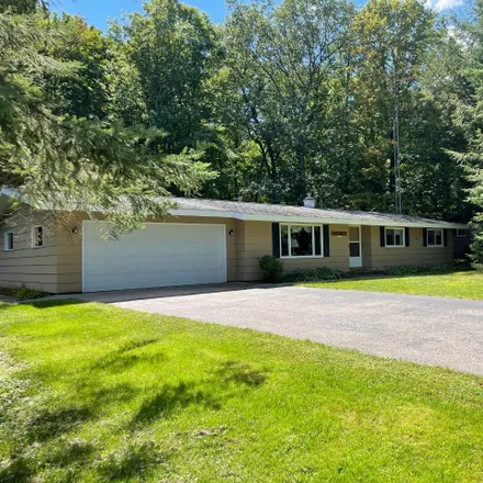 Buy this 3 bed house on 7991 Rainbow Road in Lake Tomahawk, Oneida County