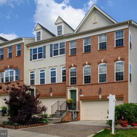 Buy this 3 bed townhouse on 8621 Stone Hill Lane in Anne Arundel County, MD 20724