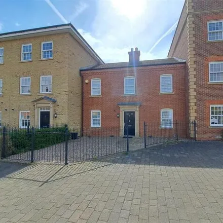 Buy this 4 bed townhouse on Greenkeepers Road in Great Denham, MK40 4GL