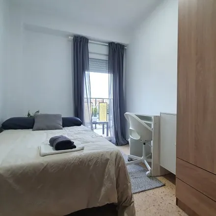 Rent this 5 bed room on Carretera d'Escrivà in 12, 46007 Valencia