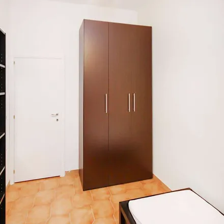 Rent this 3 bed room on Scuola media Vincenzo Cardarelli in Via Luigi Scrosati, 20146 Milan MI