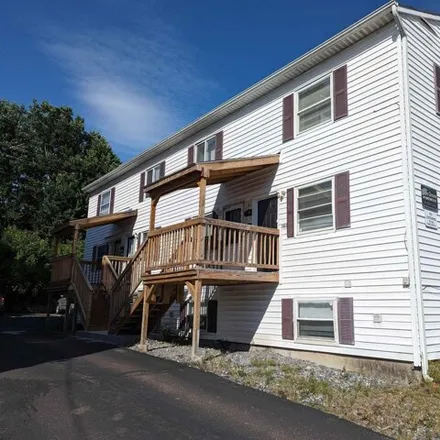 Rent this 3 bed townhouse on 169 Blaine St in Manchester, New Hampshire