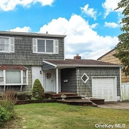 Buy this 3 bed house on 4590 Merrick Road in Massapequa, NY 11758