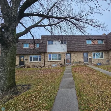 Buy this 2 bed house on Praire Sun Corner Apartments in 905 Belsly Boulevard, Moorhead