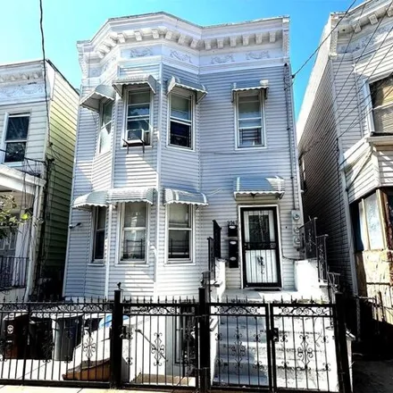 Buy this 7 bed house on 3747 Olinville Avenue in New York, NY 10467