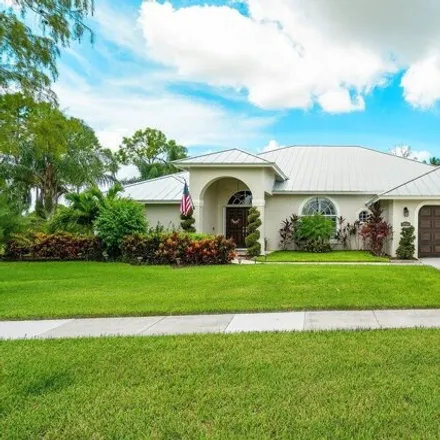 Rent this 4 bed house on 13514 Northumberland Circle in Wellington, FL 33414