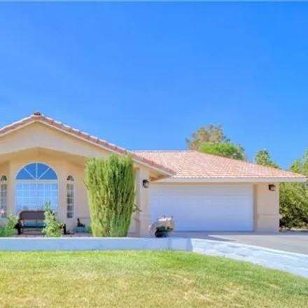 Buy this 3 bed house on 1461 West Calvada Boulevard in Pahrump, NV 89048