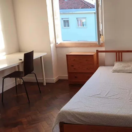 Rent this 7 bed room on Rua José Estevão 24 in 1150-192 Lisbon, Portugal