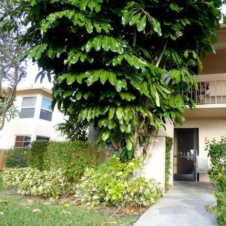 Rent this 2 bed condo on 13342 Pineapple Palm Ct