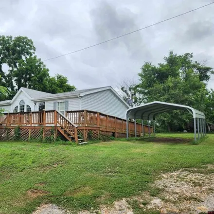 Buy this 3 bed house on 3894 Marion County 6064 in Flippin, Arkansas