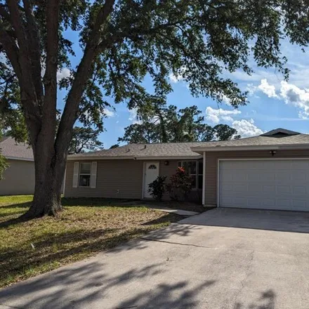 Buy this 3 bed house on 128 Wellsley Avenue Southwest in Palm Bay, FL 32908