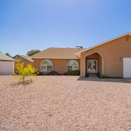 Buy this 4 bed house on 1620 North Bullmoose Drive in Chandler, AZ 85224