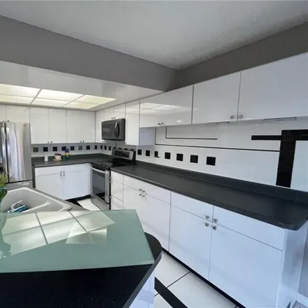 Buy this 2 bed condo on 701 Northwest 19th Street in Middle River Vista, Fort Lauderdale