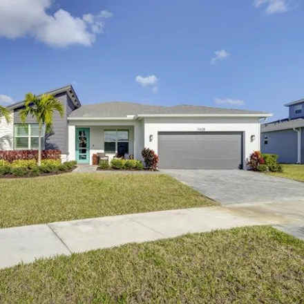 Buy this 3 bed house on Southwest Lyra Drive in Port Saint Lucie, FL
