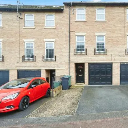 Buy this 4 bed townhouse on Raynville Garth in Leeds, LS12 2JY