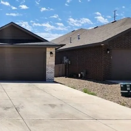 Rent this 4 bed house on Ranch Avenue in Midland, TX 79705