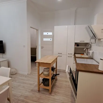 Rent this 3 bed apartment on Aleja "Solidarności" 117 in 00-140 Warsaw, Poland