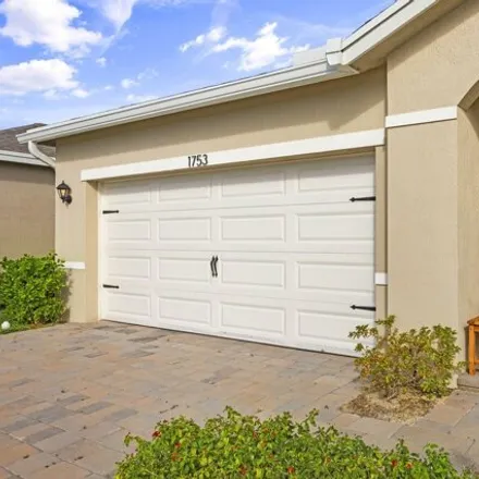 Rent this 3 bed house on Northeast White Pine Terrace in Ocean Breeze, Jensen Beach