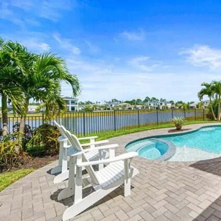Buy this 5 bed house on 5739 Gaugain Terrace in Palm Beach Gardens, FL 33418