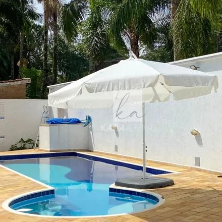 Rent this 5 bed house on Avenida Franklin de Toledo Piza in Praia Grande, Ubatuba - SP