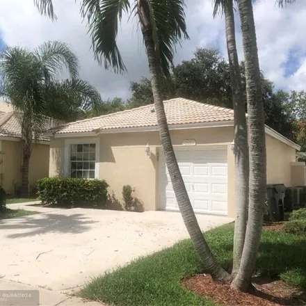 Buy this 3 bed house on 5853 Eagle Cay Lane in Coconut Creek, FL 33073
