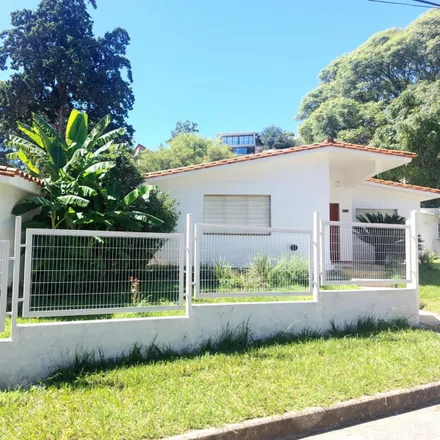 Buy this 3 bed house on Arribeños in Departamento Punilla, Villa Carlos Paz