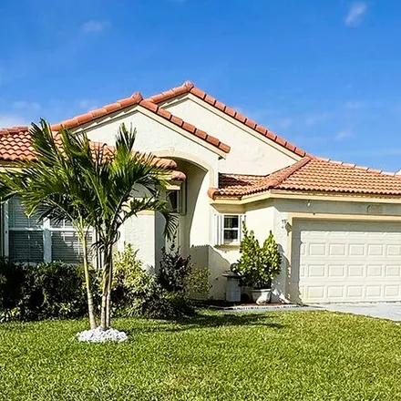Rent this 3 bed house on 9671 Tavernier Dr