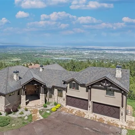 Buy this 7 bed house on 4861 Willow Stone Heights in Colorado Springs, CO 80906