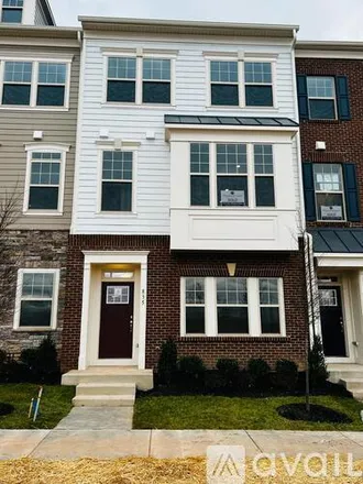 Rent this 4 bed townhouse on 835 Sawback Sq NE