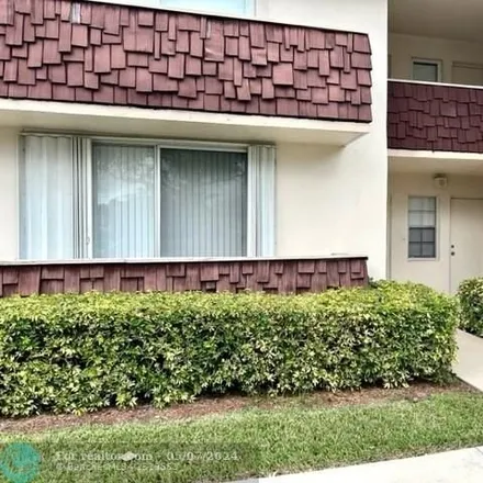 Rent this 3 bed condo on Palms Course in 3701 Oaks Clubhouse Drive, Pompano Beach