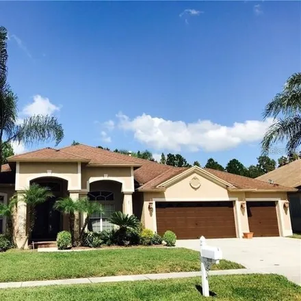 Rent this 4 bed house on 18110 Royal Forest Drive in Hillsborough County, FL 33647