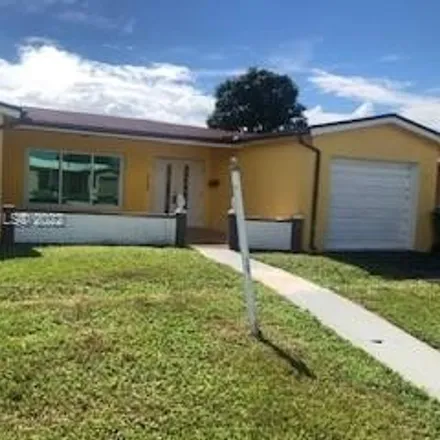 Rent this 3 bed house on 4580 Northwest 42nd Street in Lauderdale Lakes, FL 33319