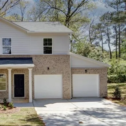 Buy this 3 bed house on 1761 Big Horn Court Southeast in Conyers, GA 30013