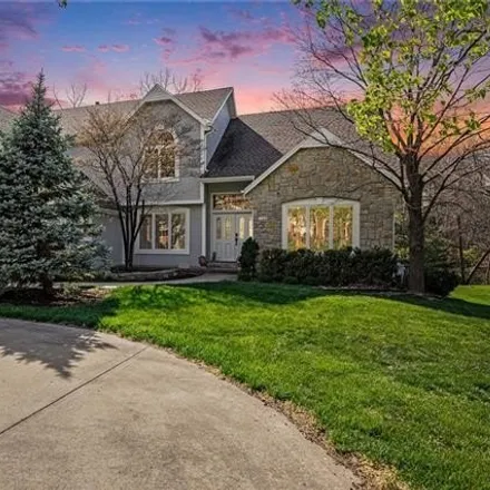 Buy this 5 bed house on Tomahawk Creek Trail in Leawood, KS 66209