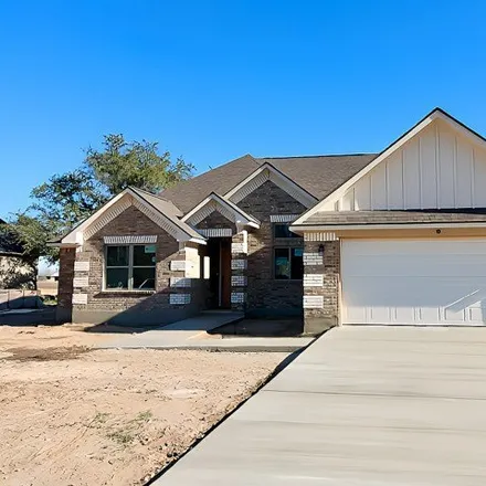 Buy this 5 bed house on 1145 Devine Drive in Devine, TX 78016