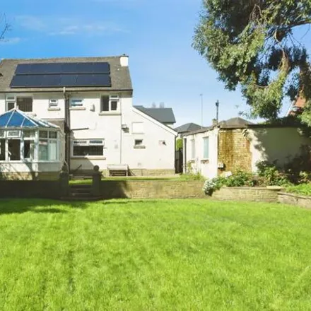 Buy this 4 bed house on Woodhall Park Crescent East in Farsley, LS28 7HG