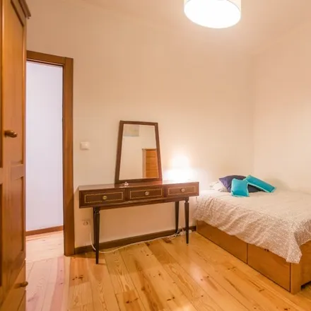 Rent this 6 bed room on Rua General Leman in 1600-993 Lisbon, Portugal