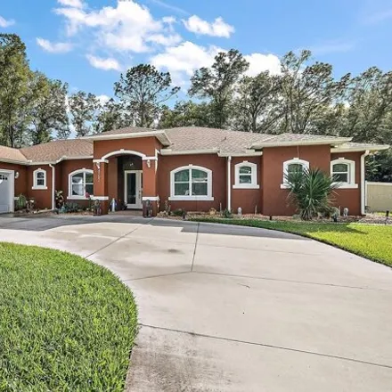 Rent this 3 bed house on 4516 Southeast 136th Lane in Marion County, FL 34491