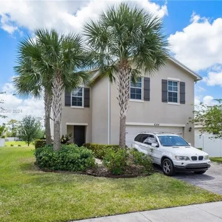Buy this 4 bed house on unnamed road in Palm Beach County, FL 33415