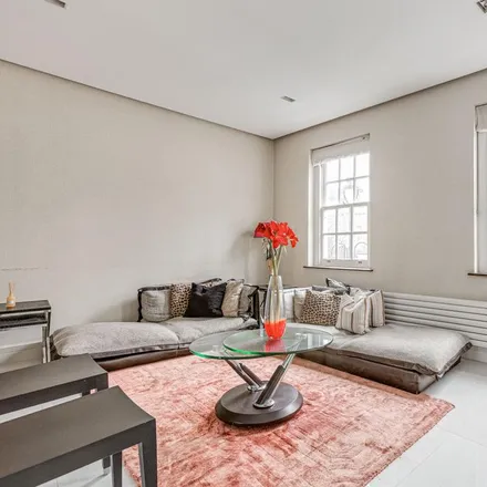 Rent this 4 bed house on Thresher Owen in Battersea Square, London