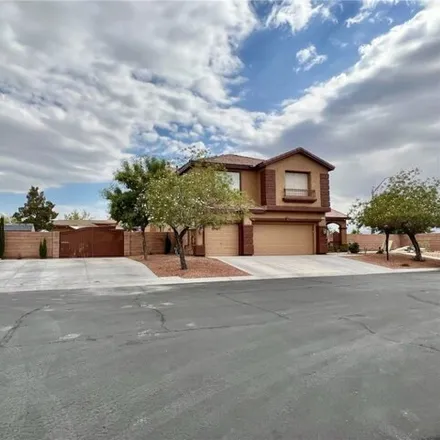 Buy this 5 bed house on 6397 Tempting Choice Avenue in Las Vegas, NV 89131