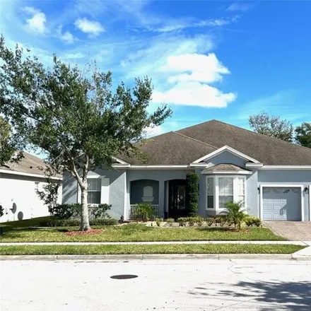 Buy this 4 bed house on 7299 Windham Harbour Avenue in Orlando, FL 32829