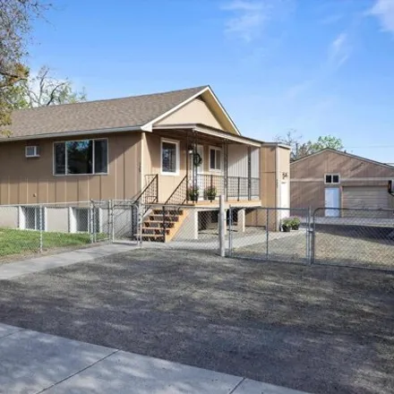 Buy this 4 bed house on 177 East 5th Avenue in Kennewick, WA 99336