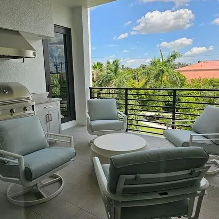 Rent this 2 bed condo on 199 12th Street North in Naples, FL 34102