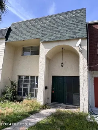 Rent this 3 bed townhouse on 6107 Tuscony Circle in Jacksonville, FL 32277