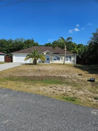 Buy this 4 bed house on 1745 Minnow Court in Polk County, FL 34759