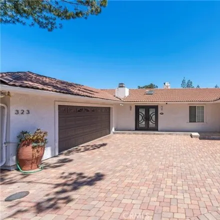 Buy this 4 bed house on 323 South del Giorgio Road in Anaheim, CA 92808